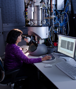 picture of a woman using a scanning probe microscope